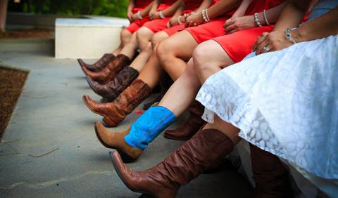 Bachelorette Party in cowboy boots on Broadway and 2nd Ave in downtown Nashville Tennessee