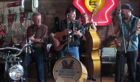 Reno & Harrell playing live bluegrass music in Antique Archaeology in Nashville Tennessee