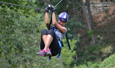 Best Zip Lines in Nashville Tennessee Girl Zip LIning in one of Nashville's Parks