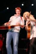 Banjo Ben Clark in concert playing with Taylor Swift